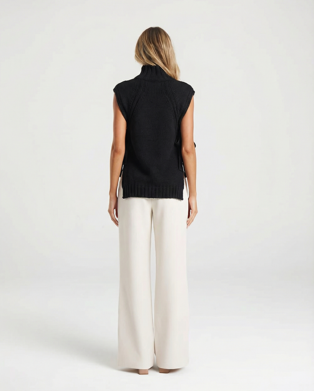 Vera | Sleeveless Ribbed Sweater Black Turtleneck Tie Side